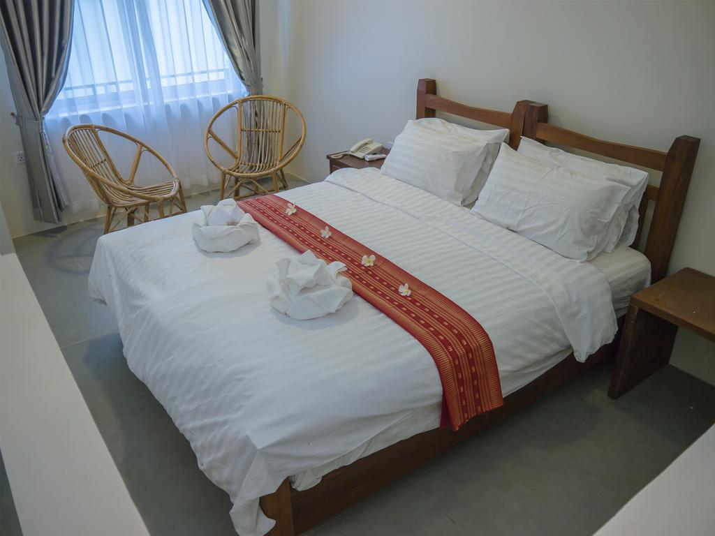Hak Boutique Hotel Siem Reap Quarto foto
